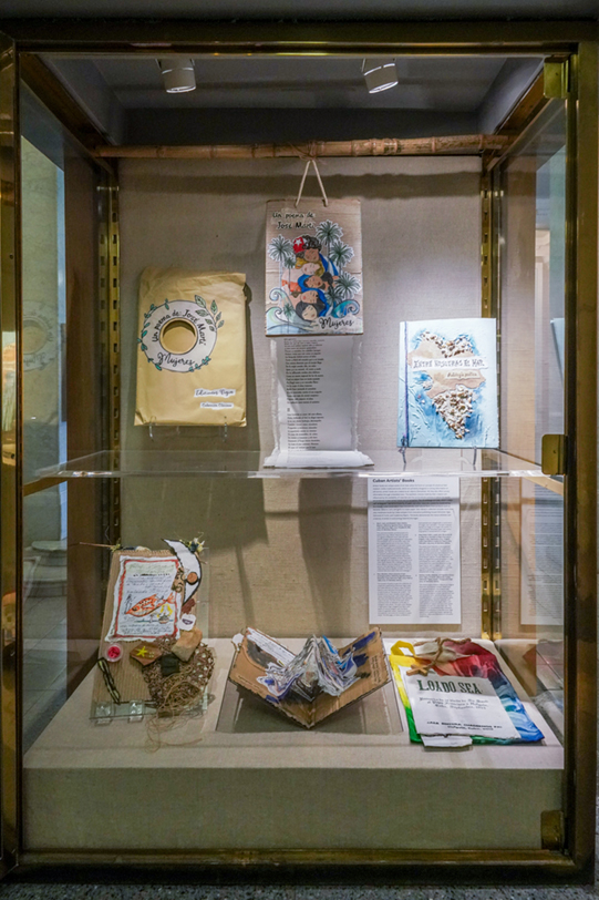 A case displays six books